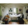 Casa de madera con ruedas GYPSY CARAVAN CON PORCHE - BLANCO