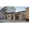 CASAS DE MADERA MODERNAS FLAT CON PORCHE VISTA FRONTAL