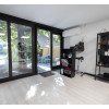 Casas de madera modernas FLOW interior peluquería