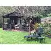 Casas de madera con porche - LASUR NEGRO