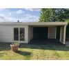 Casas de madera modernas con porche frontal HUELVA lateral