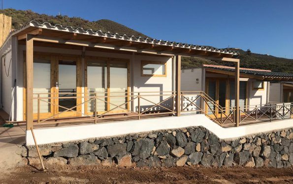 Cabañas de madera con techo plano - casas de clientes