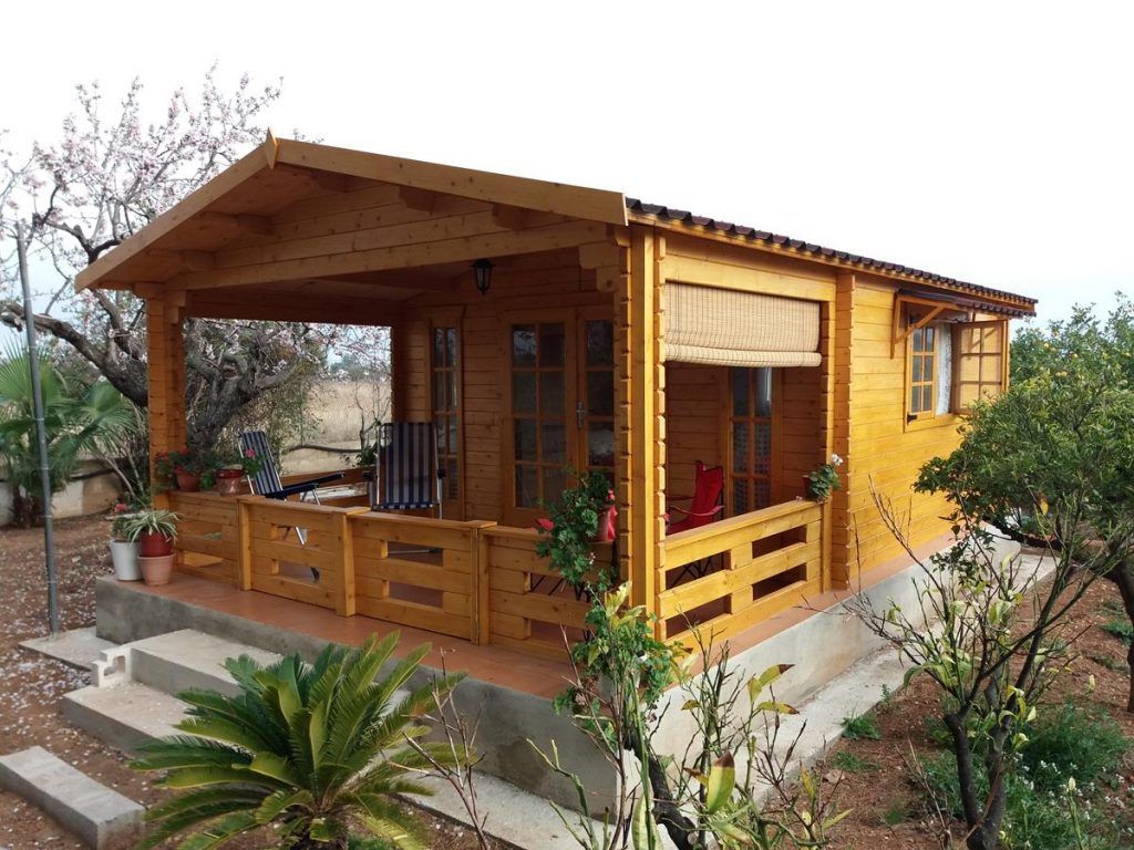 Cabañas de madera con porche de madera adosado - casas de clientes