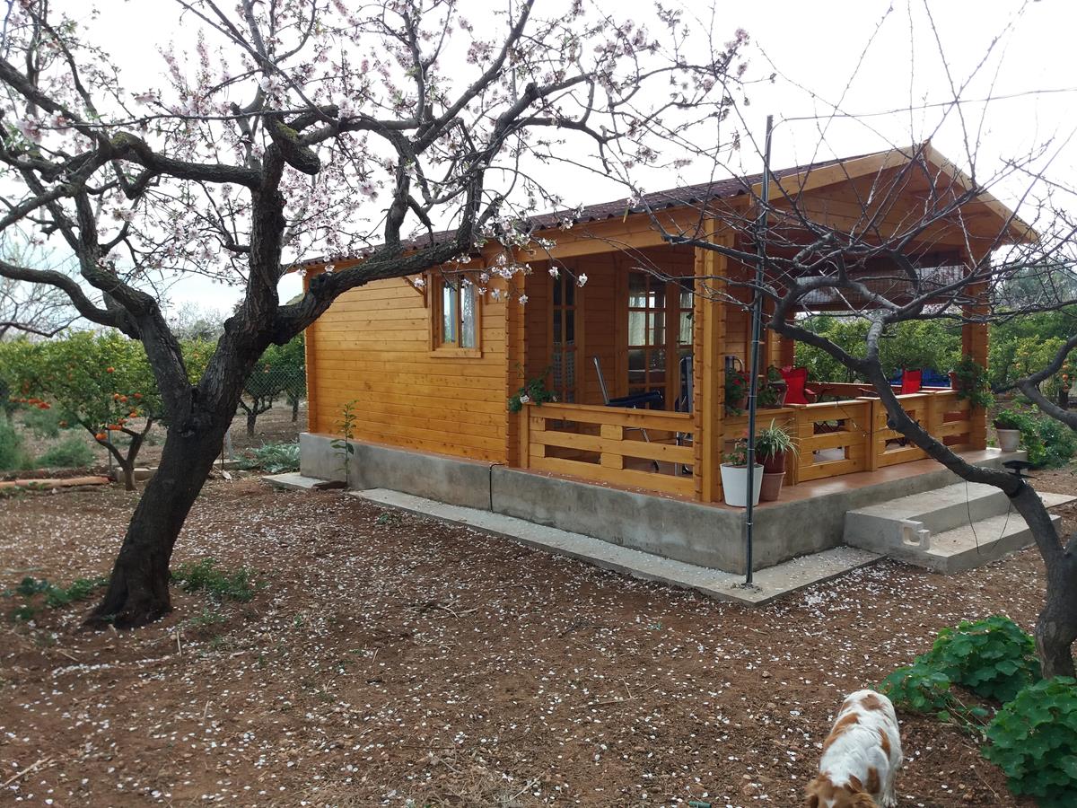 Cabañas de madera con porche de madera adosado - casas de clientes