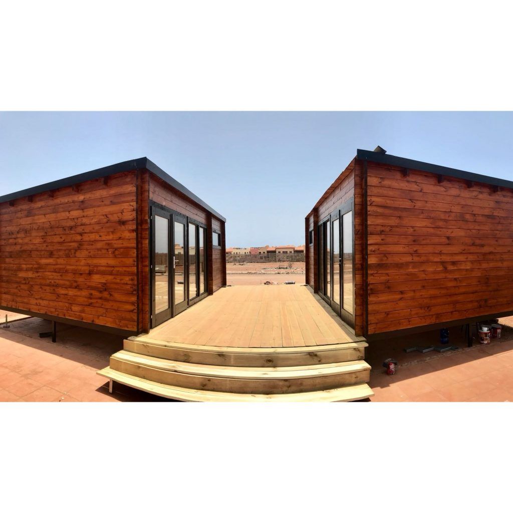 Cabañas de madera con techo plano - casas de clientes