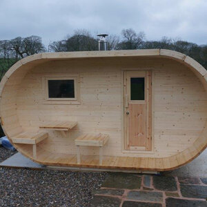 Saunas diseño original - Oval de Abeto - Medidas 405X240 CMS - SAUNA EN FORMA OVAL DE ABETO DE 405X240 CMS FRONTAL INCOLORO