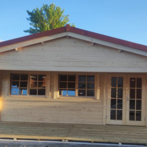 Casas de Madera Prefabricadas Jerez - 27 m2 diáfanos + 14 m2 de porche - Casas prefabricadas JEREZ 598x500+240cm - 44 MM - TEJA SANDWICH FRONTAL