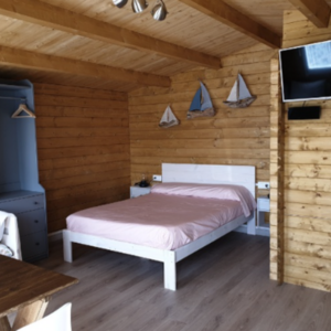 Casas de Madera Prefabricadas Gandía - 22 m2 - Diáfana - Modelo Hendrick - Casas de madera con climalit HENDRICK dormitorio